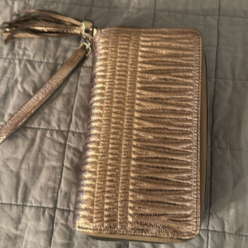 Stella Dot clutch. Rose gold metallic